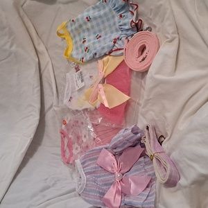 4 xs dog dresses, plus 2 matched leashes